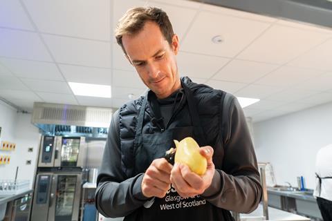 The tennis legend was even tasked with peeling some potatoes